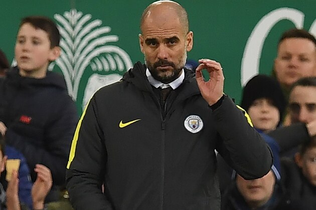 Manchester City's Spanish manager Pep Guardiola gestures on the touchline during the English Premier League football match between Everton and Manchester City at Goodison Park in Liverpool, north-west England on January 15, 2017.
Everton won the match 4-0. / AFP / Paul ELLIS / RESTRICTED TO EDITORIAL USE. No use with unauthorized audio, video, data, fixture lists, club/league logos or 'live' services. Online in-match use limited to 75 images, no video emulation. No use in betting, games or single club/league/player publications.  /         (Photo credit should read PAUL ELLIS/AFP/Getty Images)