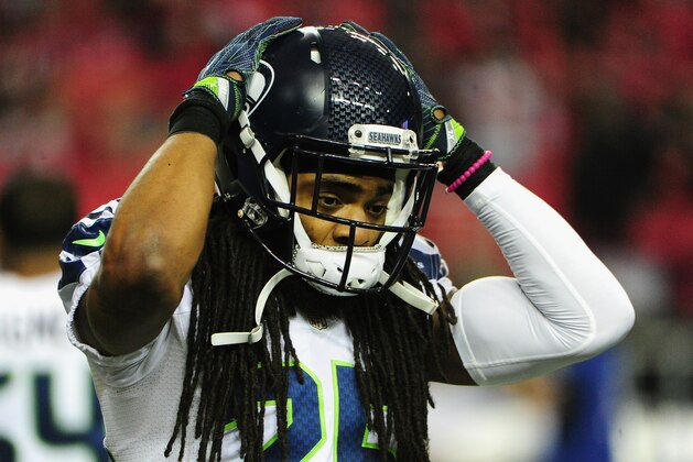 ATLANTA, GA - JANUARY 14:  Richard Sherman #25 of the Seattle Seahawks warms up prior turnover the game against the Atlanta Falcons at the Georgia Dome on January 14, 2017 in Atlanta, Georgia.  (Photo by Scott Cunningham/Getty Images)