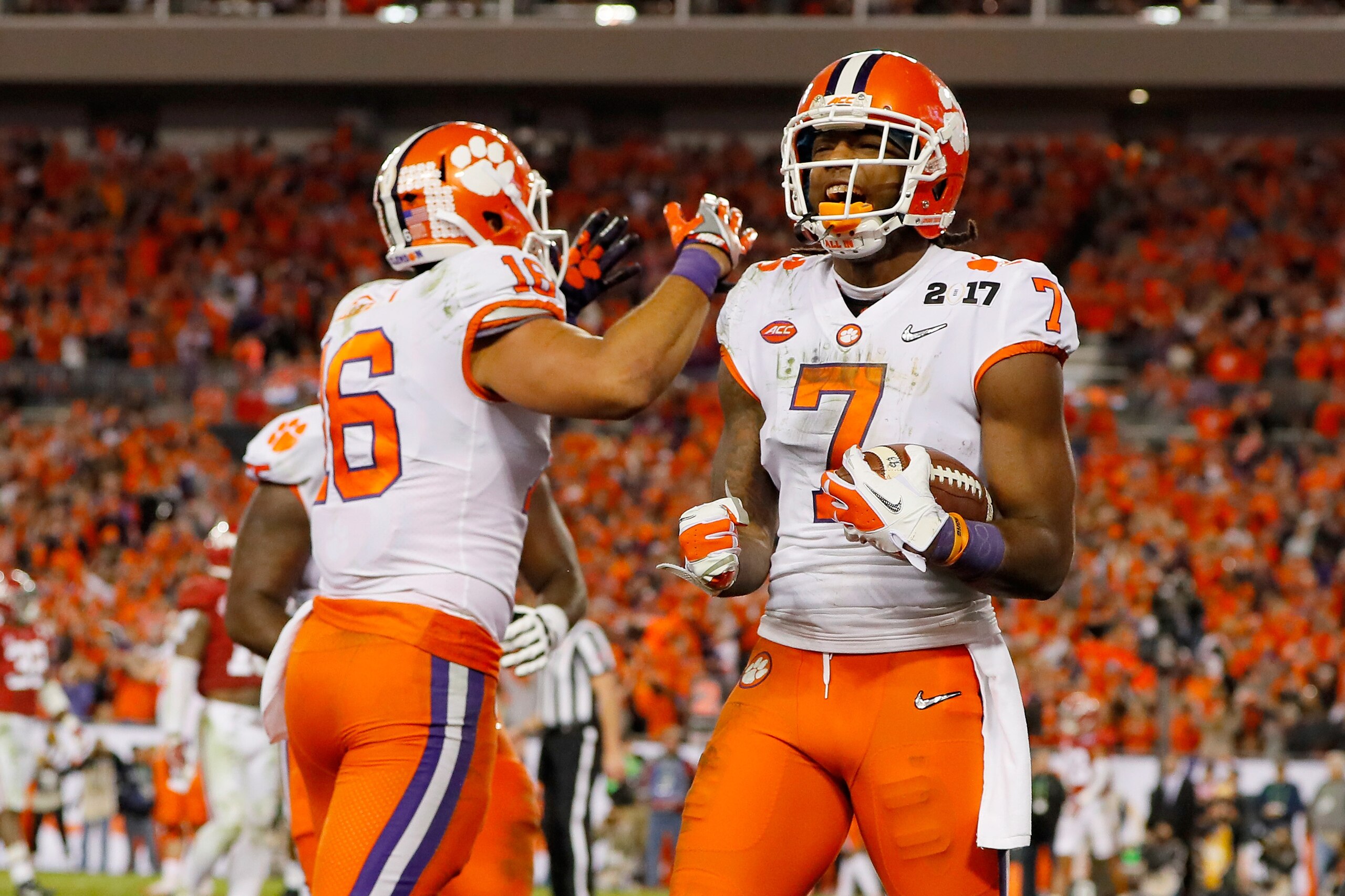 TAMPA, FL - JANUARY 09:  Wide receiver Mike Williams #7 of the Clemson Tigers celebrates with tight end Jordan Leggett #16 after scoring a 4-yard touchdown during the fourth quarter against the Alabama Crimson Tide in the 2017 College Football Playoff National Championship Game at Raymond James Stadium on January 9, 2017 in Tampa, Florida.  (Photo by Kevin C. Cox/Getty Images)