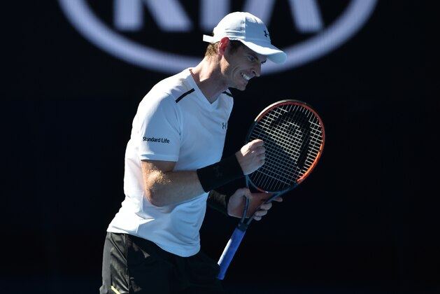 Britain's Andy Murray reacts after a point against Ukraine's Illya Marchenko during their men's singles match on day one of the Australian Open tennis tournament in Melbourne on January 16, 2017. / AFP / PETER PARKS / IMAGE RESTRICTED TO EDITORIAL USE - STRICTLY NO COMMERCIAL USE        (Photo credit should read PETER PARKS/AFP/Getty Images)