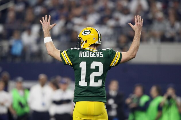 ARLINGTON, TX - JANUARY 15:  Aaron Rodgers #12 of the Green Bay Packers reacts after the Packers scored a touchdown against the Dallas Cowboys during the NFC Divisional Playoff Game at AT&T Stadium on January 15, 2017 in Arlington, Texas.  (Photo by Ezra Shaw/Getty Images)