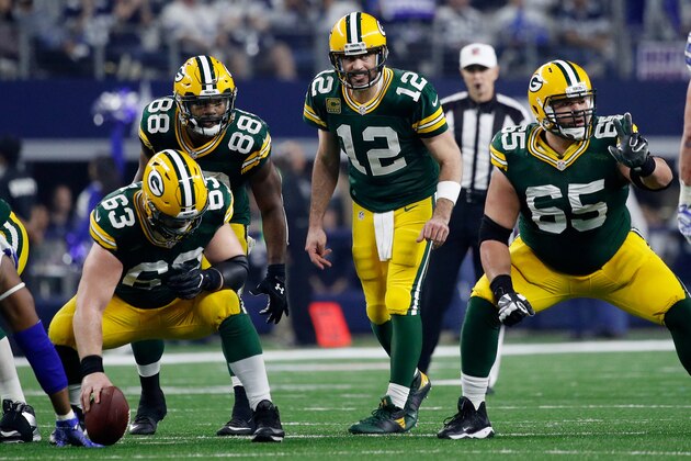 ARLINGTON, TX - JANUARY 15:  Aaron Rodgers #12 of the Green Bay Packers calls out instructions in the second half during the NFC Divisional Playoff Game against the Dallas Cowboys at AT&T Stadium on January 15, 2017 in Arlington, Texas. (Photo by Joe Robbins/Getty Images)