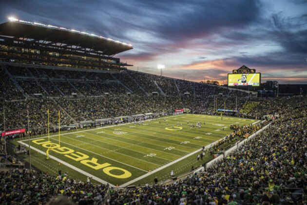 FILE - In this Oct. 8, 2016, file photo, Autzen Stadium is shown as Oregon plays Washington in an NCAA college football game in Eugene, Ore. This year, the Ducks won just two Pac-12 Conference games, capping their worst season since 1991 with a 10-point loss to arch-rival Oregon State. The swift collapse of a team known for its high-octane offenses and ever-changing uniforms led to the firing of coach Mark Helfrich. (AP Photo/Thomas Boyd, file)