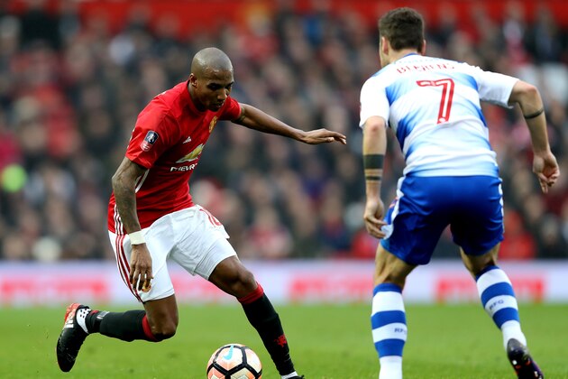 MANCHESTER, ENGLAND - JANUARY 07: Ashley Young of Manchester United takes on Roy Beerens of Reading during the Emirates FA Cup third round match between Manchester United and Reading at Old Trafford on January 7, 2017 in Manchester, England.  (Photo by Mark Thompson/Getty Images)