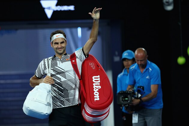 MELBOURNE, AUSTRALIA - JANUARY 16:  Roger Federer of Switzerland waves to the crowd as he leaves the court after victory in his first round match against Jurgen Melzer of Austria on day one of the 2017 Australian Open at Melbourne Park on January 16, 2017 in Melbourne, Australia.  (Photo by Clive Brunskill/Getty Images)