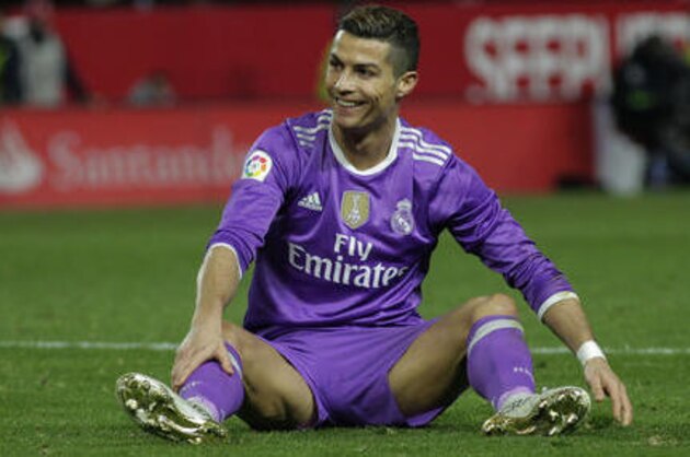 Real Madrid's Cristiano Ronaldo reacts during La Liga soccer match between Real Madrid and Sevilla at the Ramon Sanchez Pizjuan stadium, in Seville, Spain on Sunday, Jan. 15, 2017. (AP Photo/Angel Fernandez)