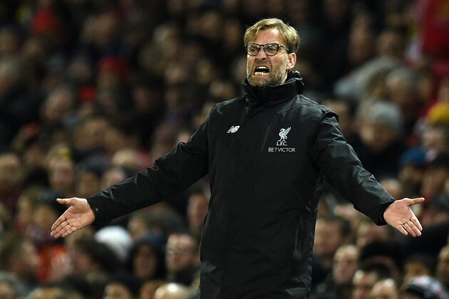 Liverpool's German manager Jurgen Klopp reacts during the English Premier League football match between Manchester United and Liverpool at Old Trafford in Manchester, north west England, on January 15, 2017. / AFP / Oli SCARFF / RESTRICTED TO EDITORIAL USE. No use with unauthorized audio, video, data, fixture lists, club/league logos or 'live' services. Online in-match use limited to 75 images, no video emulation. No use in betting, games or single club/league/player publications.  /         (Photo credit should read OLI SCARFF/AFP/Getty Images)