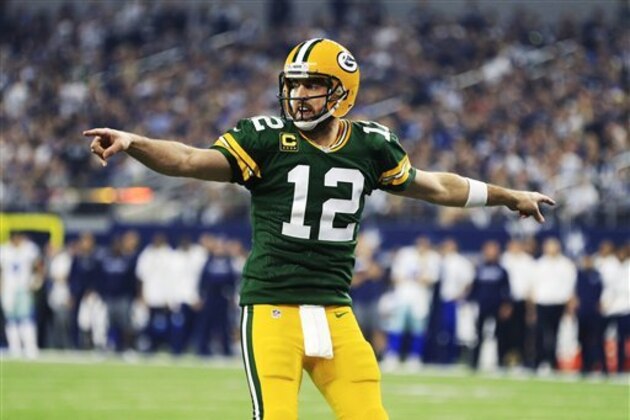 Green Bay Packers' Aaron Rodgers reacts during the first half of an NFL divisional playoff football game against the Dallas Cowboys Sunday, Jan. 15, 2017, in Arlington, Texas. (AP Photo/Ron Jenkins)