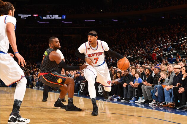 NEW YORK, NY - JANUARY 16:  Carmelo Anthony #7 of the New York Knicks drives to the basket against Paul Millsap #4 of the Atlanta Hawks during the game on January 16, 2017 at Madison Square Garden in New York, New York. NOTE TO USER: User expressly acknowledges and agrees that, by downloading and or using this photograph, User is consenting to the terms and conditions of the Getty Images License Agreement. Mandatory Copyright Notice: Copyright 2017 NBAE (Photo by Jesse D. Garrabrant/NBAE via Getty Images)