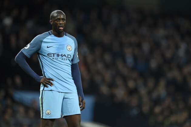 Manchester City's Ivorian midfielder Yaya Toure reacts during the English Premier League football match between Manchester City and Arsenal at the Etihad Stadium in Manchester, north west England, on December 18, 2016. / AFP / Oli SCARFF / RESTRICTED TO EDITORIAL USE. No use with unauthorized audio, video, data, fixture lists, club/league logos or 'live' services. Online in-match use limited to 75 images, no video emulation. No use in betting, games or single club/league/player publications. / (Photo credit should read OLI SCARFF/AFP/Getty Images) Manchester City's Ivorian midfielder Yaya Toure reacts during the English Premier League football match between Manchester City and Arsenal at the Etihad Stadium in Manchester, north west England, on December 18, 2016. / AFP / Oli SCARFF / RESTRICTED TO EDITORIAL USE. No use with unauthorized audio, video, data, fixture lists, club/league logos or 'live' services. Online in-match use limited to 75 images, no video emulation. No use in betting, games or single club/league/player publications. / (Photo credit should read OLI SCARFF/AFP/Getty Images)