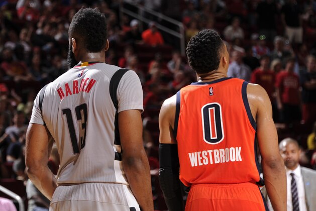 HOUSTON, TX - APRIL 3:  James Harden #13 of the Houston Rockets and Russell Westbrook #0 of the Oklahoma City Thunder stand on the court together during the game on April 3, 2016 at the Toyota Center in Houston, Texas. NOTE TO USER: User expressly acknowledges and agrees that, by downloading and or using this photograph, User is consenting to the terms and conditions of the Getty Images License Agreement. Mandatory Copyright Notice: Copyright 2016 NBAE (Photo by Bill Baptist/NBAE via Getty Images)