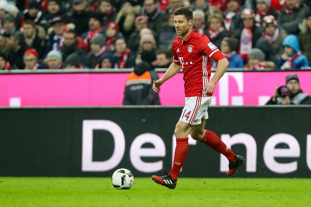 MUNICH, GERMANY - DECEMBER 21: Xabi Alonso of Muenchen in action during the Bundesliga match between Bayern Muenchen and RB Leipzig at Allianz Arena on December 21, 2016 in Munich, Germany. (Photo by TF-Images/Getty Images)