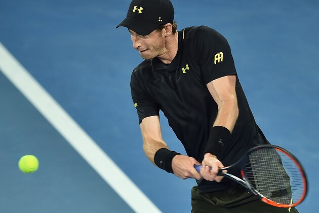 Britain's Andy Murray hits a return against Andrey Rublev of Russia during their men's singles match on day three of the Australian Open tennis tournament in Melbourne on January 18, 2017. / AFP / PETER PARKS / IMAGE RESTRICTED TO EDITORIAL USE - STRICTLY NO COMMERCIAL USE        (Photo credit should read PETER PARKS/AFP/Getty Images)