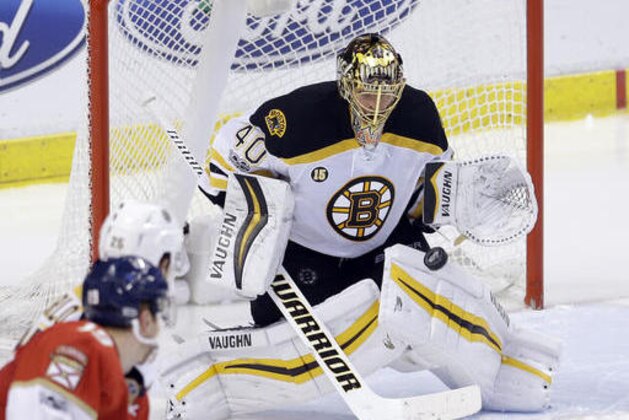 Boston Bruins goalie Tuukka Rask (40) prepares to stop a shot by Florida Panthers defenseman Michael Matheson (19) in the third period of an NHL hockey game, Saturday, Jan. 7, 2017, in Sunrise, Fla. (AP Photo/Alan Diaz)