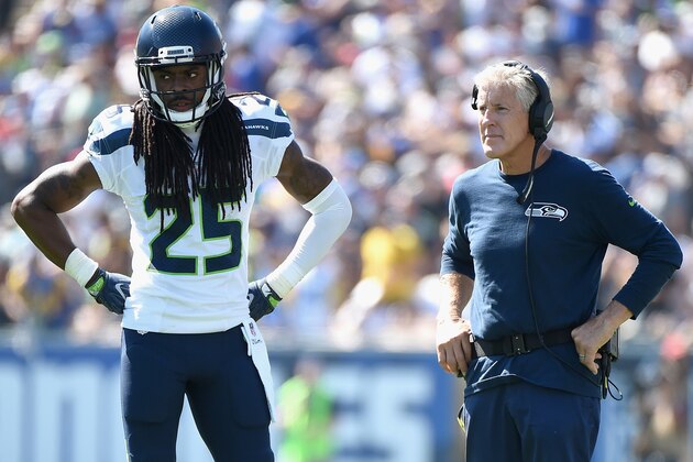 LOS ANGELES, CA - SEPTEMBER 18:  Head coach Pete Carroll of the Seattle Seahawks speaks to  Richard Sherman #25 in the second quarter of the home opening NFL game against the Los Angeles Rams at Los Angeles Coliseum on September 18, 2016 in Los Angeles, California.  (Photo by Harry How/Getty Images)