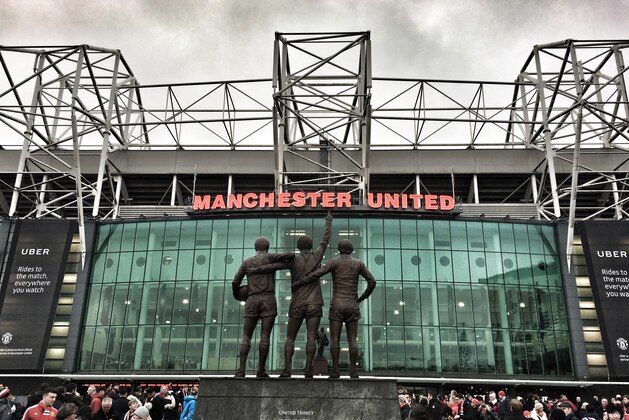 MANCHESTER, ENGLAND - JANUARY 15:  (EDITORS NOTE: This images has been processed using digital filters). A general view of the trinity statue of Law, Best and Charlton outside the stadium prior the Premier League match between Manchester United and Liverpool at Old Trafford on January 15, 2017 in Manchester, England.  (Photo by Mike Hewitt/Getty Images)