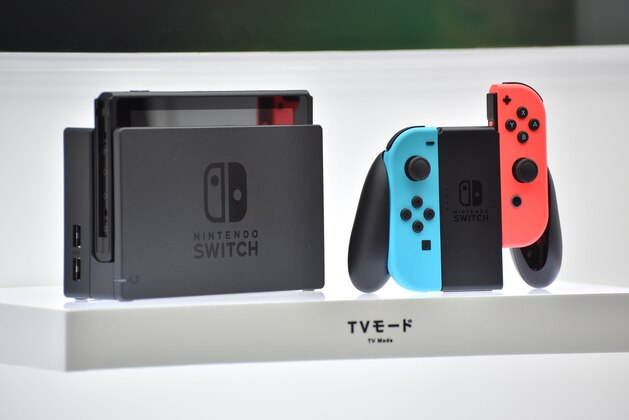 Nintendo's new video game console Switch is displayed at a presentation in Tokyo on January 13, 2017.  
Nintendo on January 13 unveiled its new Switch game console, which works both at home and on-the-go, as it looks to offset disappointing Wii U sales and go head to head with rival Sony's hugely popular PlayStation 4. / AFP / Kazuhiro NOGI        (Photo credit should read KAZUHIRO NOGI/AFP/Getty Images)