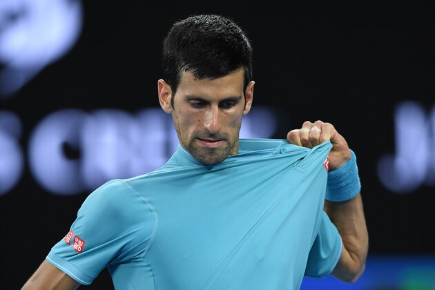 TOPSHOT - Serbia's Novak Djokovic reacts after a point against Spain's Fernando Verdasco during their men's singles match on day two of the Australian Open tennis tournament in Melbourne on January 17, 2017. / AFP / GREG WOOD / IMAGE RESTRICTED TO EDITORIAL USE - STRICTLY NO COMMERCIAL USE (Photo credit should read GREG WOOD/AFP/Getty Images) TOPSHOT - Serbia's Novak Djokovic reacts after a point against Spain's Fernando Verdasco during their men's singles match on day two of the Australian Open tennis tournament in Melbourne on January 17, 2017. / AFP / GREG WOOD / IMAGE RESTRICTED TO EDITORIAL USE - STRICTLY NO COMMERCIAL USE (Photo credit should read GREG WOOD/AFP/Getty Images)