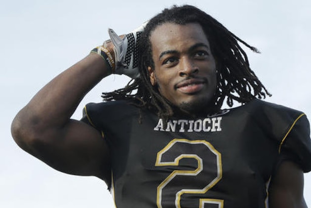 Antioch High's Najee Harris is interviewed after a high school football game against Pittsburg High in Antioch, Calif., Saturday, Nov. 5, 2016. (AP Photo/Jeff Chiu)