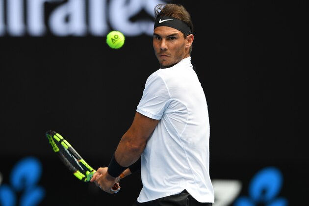 Spain's Rafael Nadal hits a return against Germany's Florian Mayer during their men's singles match on day two of the Australian Open tennis tournament in Melbourne on January 17, 2017. / AFP / GREG WOOD / IMAGE RESTRICTED TO EDITORIAL USE - STRICTLY NO COMMERCIAL USE        (Photo credit should read GREG WOOD/AFP/Getty Images)