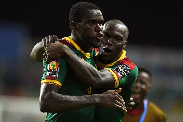 Cameroon's defender Michael Ngadeu-Ngadjui celebrates with Cameroon's forward Vincent Aboubakar (R) after scoring a goal during the 2017 Africa Cup of Nations group A football match between Cameroon and Guinea-Bissau at the Stade de l'Amitie Sino-Gabonaise in Libreville on January 18, 2017. / AFP / GABRIEL BOUYS        (Photo credit should read GABRIEL BOUYS/AFP/Getty Images)