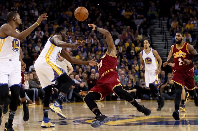 OAKLAND, CA - JANUARY 16:  Draymond Green #23 of the Golden State Warriors fouls LeBron James #23 of the Cleveland Cavaliers at ORACLE Arena on January 16, 2017 in Oakland, California. NOTE TO USER: User expressly acknowledges and agrees that, by downloading and or using this photograph, User is consenting to the terms and conditions of the Getty Images License Agreement.  (Photo by Ezra Shaw/Getty Images)