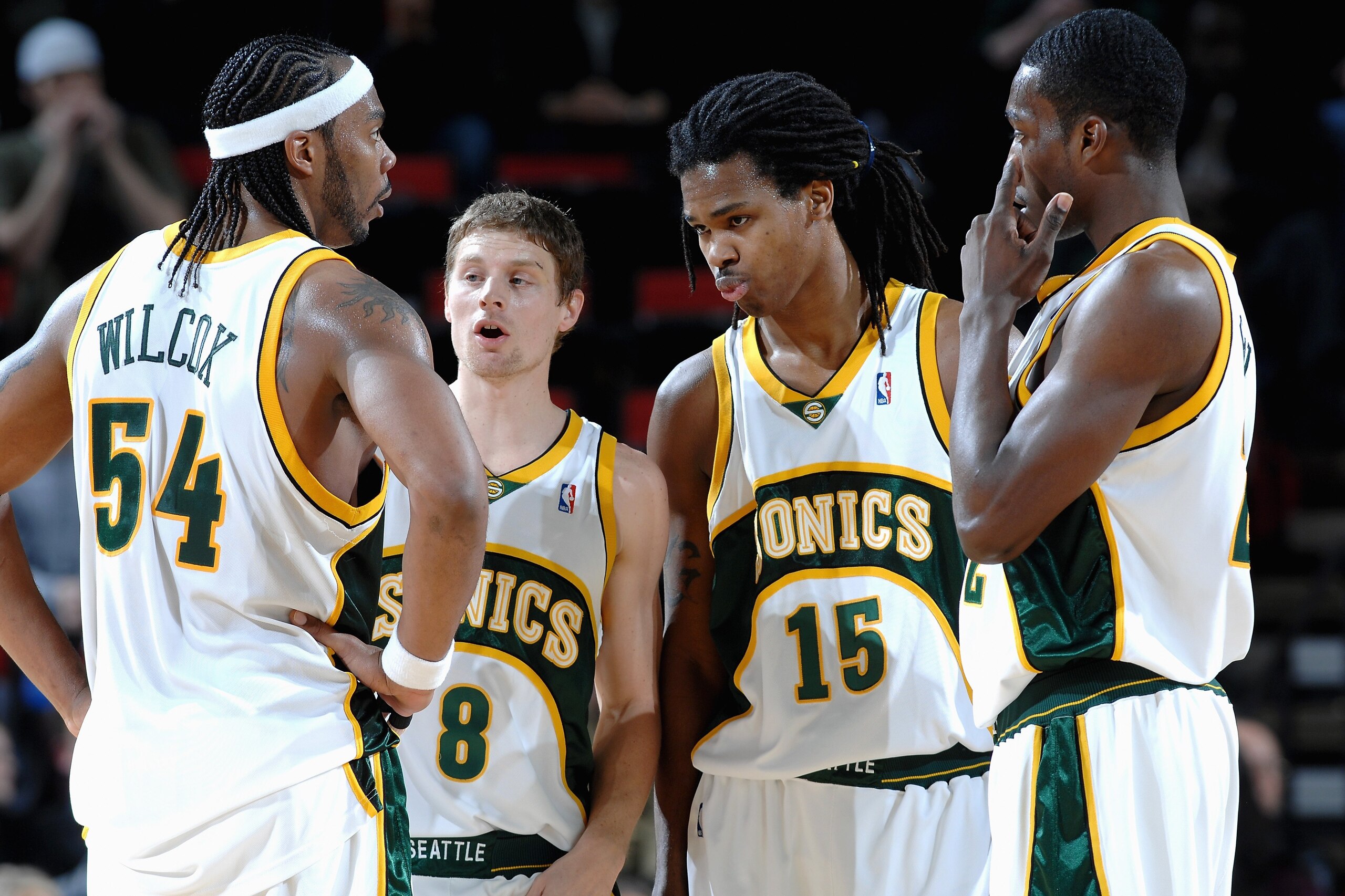 SEATTLE - MARCH 14:  Chris Wilcox #54, Luke Ridnour #8, Mickael Gelabale #15 and Jeff Green #22 of Seattle SuperSonics form a huddle during a break in game action against the Minnesota Timberwolves on March 14, 2008 at the Key Arena in Seattle, Washington. The Timberwolves won 121-116. NOTE TO USER: User expressly acknowledges and agrees that, by downloading and or using this Photograph, User is consenting to the terms and conditions of the Getty Images License Agreement. Mandatory Copyright Notice: Copyright 2008 NBAE (Photo by Terrence Vaccaro/NBAE via Getty Images)