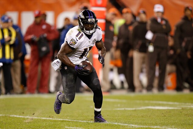 CLEVELAND, OH - NOVEMBER 30:  Kamar Aiken #11 of the Baltimore Ravens carries the ball against the Cleveland Browns at FirstEnergy Stadium on November 30, 2015 in Cleveland, Ohio.  (Photo by Gregory Shamus/Getty Images)