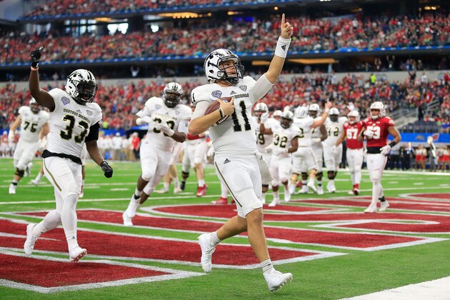 ARLINGTON, TX - JANUARY 02:  Zach Terrell #11 of the Western Michigan Broncos celebrates after scoring in the second period during the 81st Goodyear Cotton Bowl Classic between Western Michigan and Wisconsin at AT&T Stadium on January 2, 2017 in Arlington, Texas.  (Photo by Ron Jenkins/Getty Images)