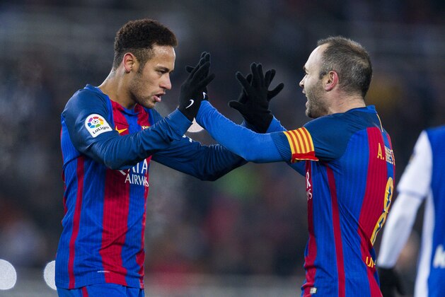SAN SEBASTIAN, SPAIN - JANUARY 19:  Neymar Jr. of FC Barcelona celebrates with his teammate Andres Iniesta of FC Barcelona after scoring the opening goal during the Copa del Rey Quarter Final, First Leg match between Real Sociedad de Futbol and FC Barcelona at Estadio Anoeta on January 19, 2017 in San Sebastian, Spain.  (Photo by Juan Manuel Serrano Arce/Getty Images)