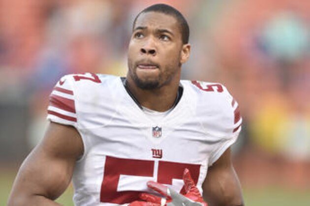 New York Giants linebacker Keenan Robinson (57) walks off the field after an NFL football game against the Cleveland Browns, Sunday, Nov. 27, 2016, in Cleveland. The Giants won 27-13. (AP Photo/David Richard)