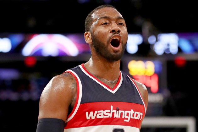 NEW YORK, NY - JANUARY 19:  John Wall #2 of the Washington Wizards celebrates in the fourth quarter against the New York Knicks at Madison Square Garden on January 19, 2017 in New York City. NOTE TO USER: User expressly acknowledges and agrees that, by downloading and or using this Photograph, user is consenting to the terms and conditions of the Getty Images License Agreement  (Photo by Elsa/Getty Images)