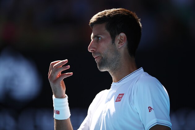 MELBOURNE, AUSTRALIA - JANUARY 19:  Novak Djokovic of Serbia looks on in his second round match against Denis Istomin of Uzbekistan on day four of the 2017 Australian Open at Melbourne Park on January 19, 2017 in Melbourne, Australia.  (Photo by Clive Brunskill/Getty Images)