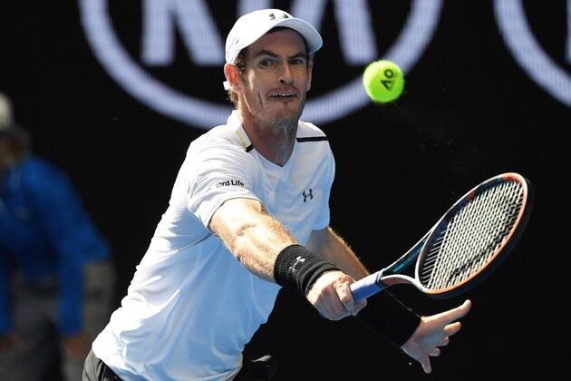 Britain's Andy Murray hits a return against Sam Querrey of the US during their men's singles third round match on day five of the Australian Open tennis tournament in Melbourne on January 20, 2017. / AFP / SAEED KHAN / IMAGE RESTRICTED TO EDITORIAL USE - STRICTLY NO COMMERCIAL USE        (Photo credit should read SAEED KHAN/AFP/Getty Images)