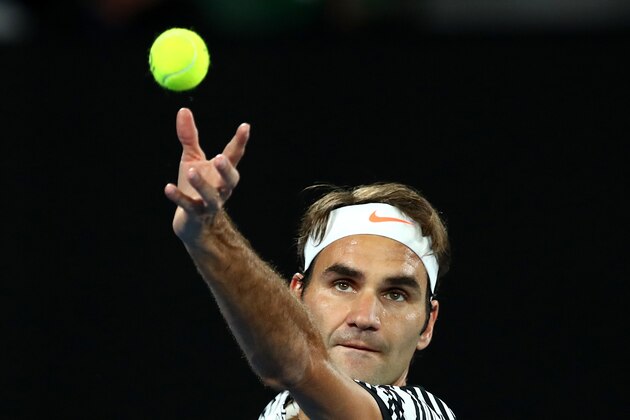 MELBOURNE, AUSTRALIA - JANUARY 20:  Roger Federer of Switzerland serves in his third round match against Thomas Berdych of the Czech Republic on day five of the 2017 Australian Open at Melbourne Park on January 20, 2017 in Melbourne, Australia.  (Photo by Cameron Spencer/Getty Images)