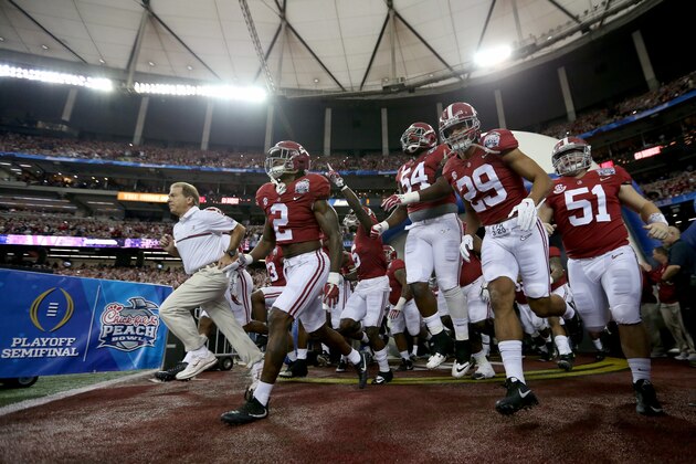 ATLANTA, GA - DECEMBER 31:  Head Coach Nick Saban and the Alabama Crimson Tide team take the field during the 2016 Chick-fil-A Peach Bowl at the Georgia Dome on December 31, 2016 in Atlanta, Georgia.  (Photo by Streeter Lecka/Getty Images)