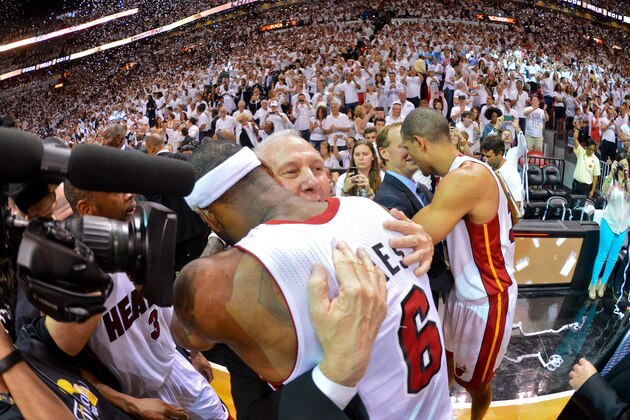 MIAMI, FL - JUNE 20: LeBron James #6 of the Miami Heat hugs Head Coach Gregg Popovich of the San Antonio Spurs following the Heat's victory against the Spurs in Game Seven of the 2013 NBA Finals on June 20, 2013 at American Airlines Arena in Miami, Florida. NOTE TO USER: User expressly acknowledges and agrees that, by downloading and or using this photograph, User is consenting to the terms and conditions of the Getty Images License Agreement. Mandatory Copyright Notice: Copyright 2013 NBAE (Photo by Jesse D. Garrabrant/NBAE via Getty Images)