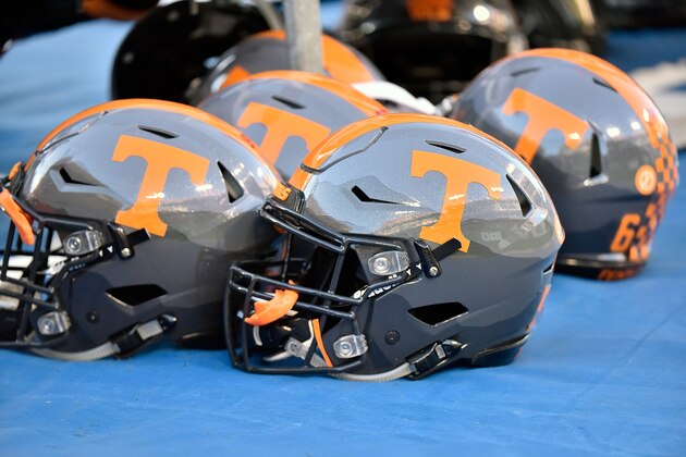 NASHVILLE, TN - DECEMBER 30:  Helmets of the University of Tennessee Volunteers rest on the sideline during a game against the Nebraska Cornhuskers during the Franklin American Mortgage Music City Bowl at Nissan Stadium on December 30, 2016 in Nashville, Tennessee.  (Photo by Frederick Breedon/Getty Images)