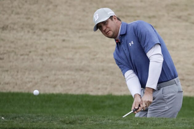 Hudson Swafford chips to the 11th hole during the second round of the CareerBuilder Challenge golf tournament on the Jack Nicklaus Tournament Course at PGA West Friday, Jan. 20, 2017, in La Quinta, Calif. (AP Photo/Chris Carlson)