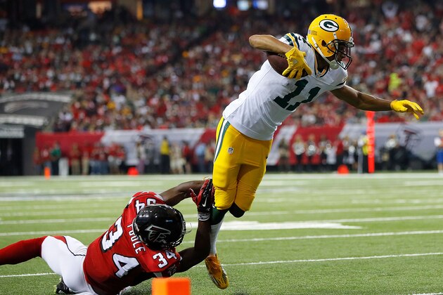 ATLANTA, GA - OCTOBER 30:  Trevor Davis #11 of the Green Bay Packers attempts to break this tackle by Brian Poole #34 of the Atlanta Falcons at Georgia Dome on October 30, 2016 in Atlanta, Georgia.  (Photo by Kevin C. Cox/Getty Images)