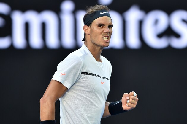 Spain's Rafael Nadal reacts after a point against Germany's Alexander Zverev during their men's singles third round match on day six of the Australian Open tennis tournament in Melbourne on January 21, 2017. / AFP / PETER PARKS / IMAGE RESTRICTED TO EDITORIAL USE - STRICTLY NO COMMERCIAL USE        (Photo credit should read PETER PARKS/AFP/Getty Images)