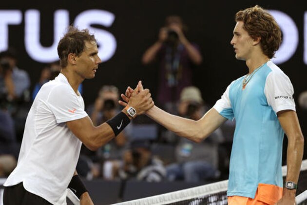 Spain's Rafael Nadal, left, is congratulated by Germany's Alexander Zverev after winning their third round match at the Australian Open tennis championships in Melbourne, Australia, Saturday, Jan. 21, 2017. (AP Photo/Dita Alangkara)