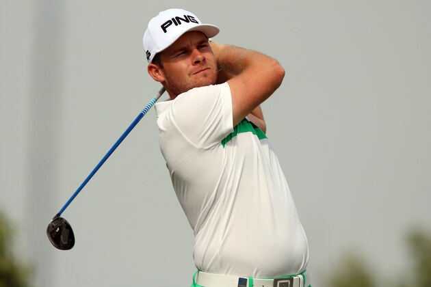 Tyrell Hatton of England plays a shot during the first round of the Abu Dhabi Golf Championship in the capital of the United Arab Emirates on January 19, 2017. / AFP / Nezar BALOUT        (Photo credit should read NEZAR BALOUT/AFP/Getty Images)
