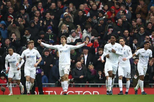 LIVERPOOL, ENGLAND - JANUARY 21:  Fernando Llorente of Swansea City celebrates scoring his sides second goal during the Premier League match between Liverpool and Swansea City at Anfield on January 21, 2017 in Liverpool, England.  (Photo by Julian Finney/Getty Images)