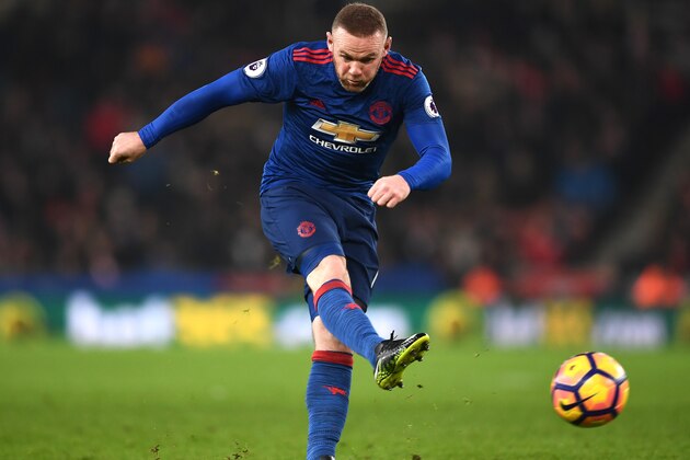 STOKE ON TRENT, ENGLAND - JANUARY 21: Wayne Rooney of Manchester United shoots during the Premier League match between Stoke City and Manchester United at Bet365 Stadium on January 21, 2017 in Stoke on Trent, England.  (Photo by Laurence Griffiths/Getty Images)