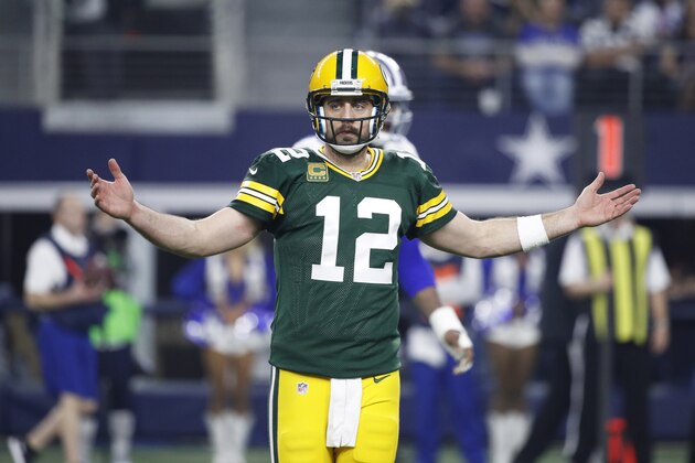ARLINGTON, TX - JANUARY 15: Aaron Rodgers #12 of the Green Bay Packers reacts during the NFC Divisional Playoff game against the Dallas Cowboys at AT&T Stadium on January 15, 2017 in Arlington, Texas. The Packers defeated the Cowboys 34-31. (Photo by Joe Robbins/Getty Images)