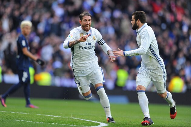 MADRID, SPAIN - JANUARY 21:   Sergio Ramos of Real Madrid celebrates with Nacho after scoring his team's 1st goal during the La Liga match between Real Madrid CF and Malaga CF at the Bernabeu on January 21, 2017 in Madrid, Spain.  (Photo by Denis Doyle/Getty Images)
