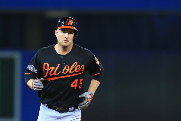 TORONTO, ON - OCTOBER 04:  Mark Trumbo #45 of the Baltimore Orioles runs the bases after hitting a two-run home run in the fourth inning against the Toronto Blue Jays during the American League Wild Card game at Rogers Centre on October 4, 2016 in Toronto, Canada.  (Photo by Vaughn Ridley/Getty Images)