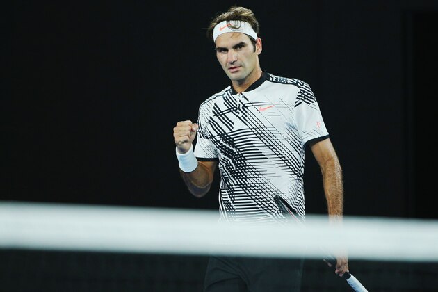 MELBOURNE, AUSTRALIA - JANUARY 22:  Roger Federer of Switzerland celebrates a point in his fourth round match against Kei Nishikori of Japan on day seven of the 2017 Australian Open at Melbourne Park on January 22, 2017 in Melbourne, Australia.  (Photo by Michael Dodge/Getty Images)