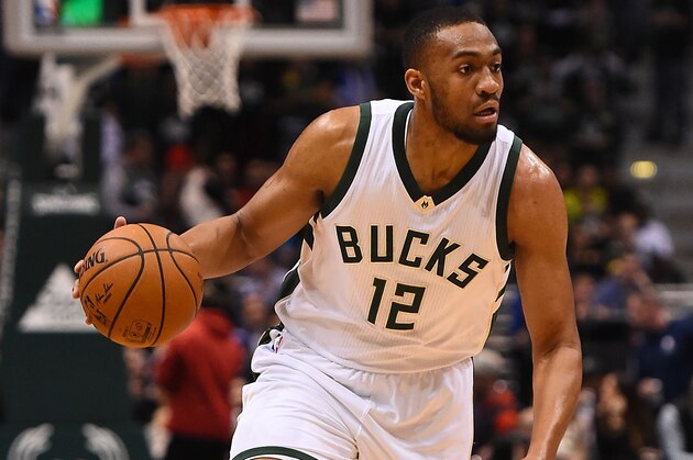 MILWAUKEE, WI - JANUARY 16:  Jabari Parker #12 of the Milwaukee Bucks handles the ball during a game against the Philadelphia 76ers at BMO Harris Bradley Center on January 16, 2017 in Milwaukee, Wisconsin.  NOTE TO USER: User expressly acknowledges and agrees that, by downloading and or using this photograph, User is consenting to the terms and conditions of the Getty Images License Agreement.  (Photo by Stacy Revere/Getty Images)